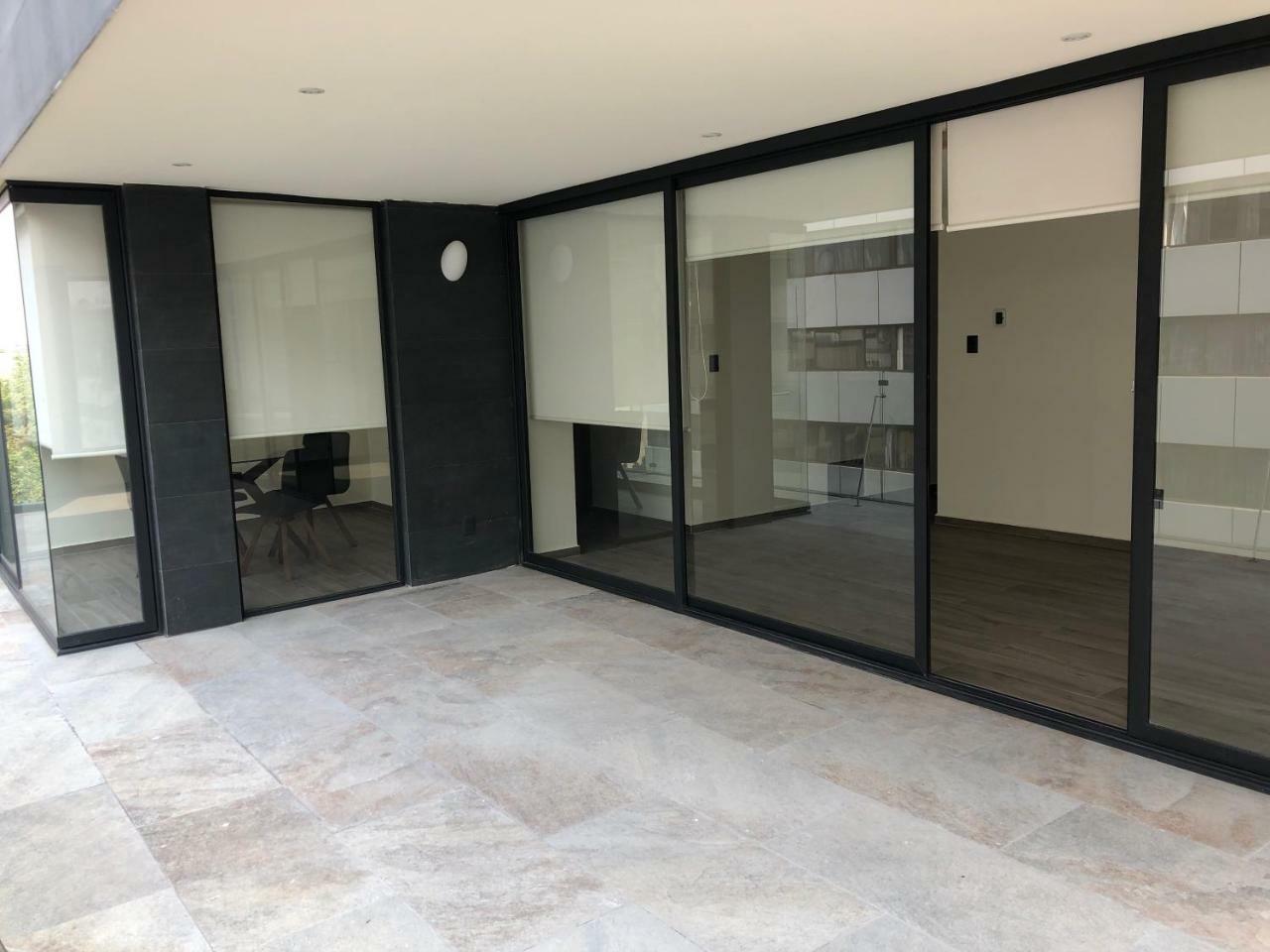 MC Suites Città del Messico Esterno foto A glass sliding door