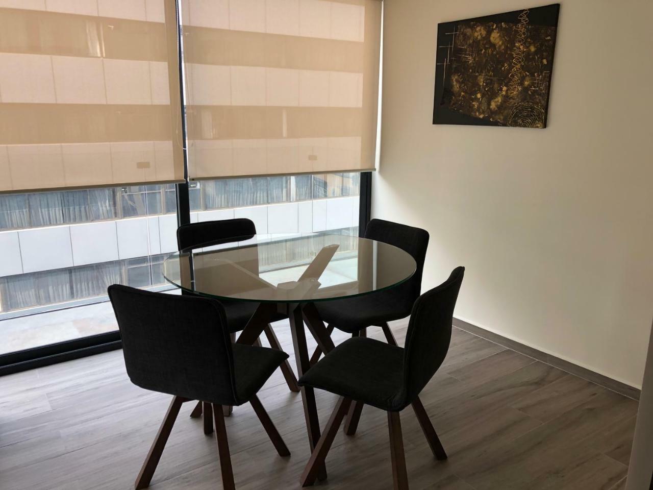 MC Suites Città del Messico Esterno foto A dining room table
