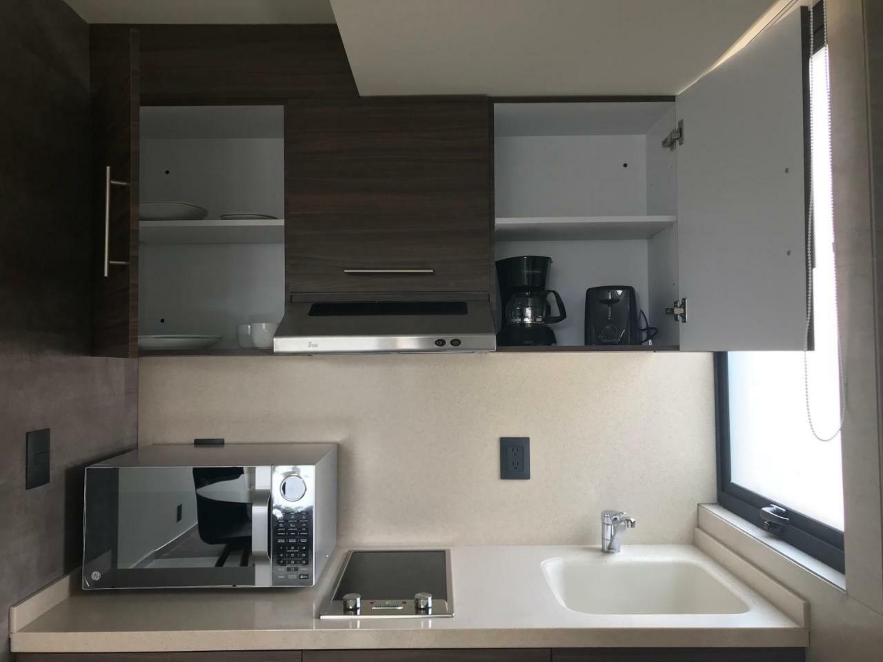 MC Suites Città del Messico Esterno foto A kitchenette in a hotel